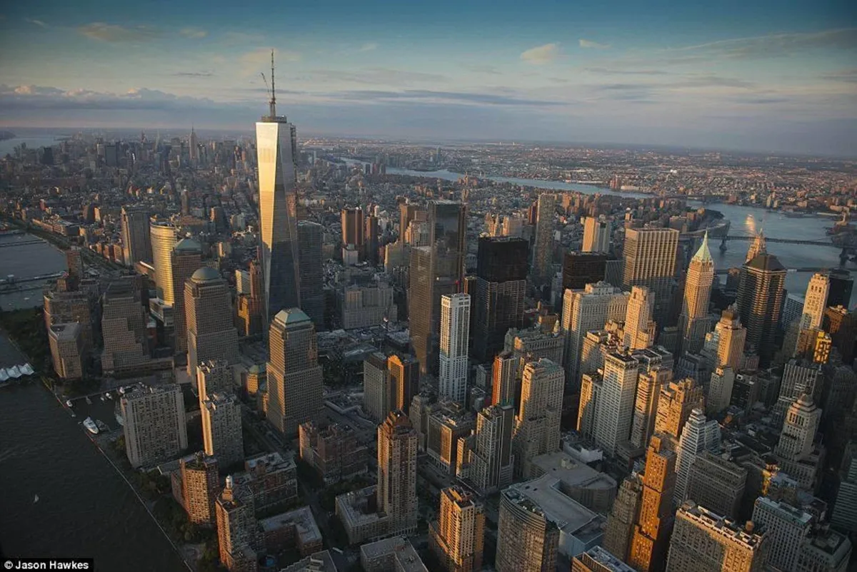 Lower Manhattan and One World Trade Center at dusk